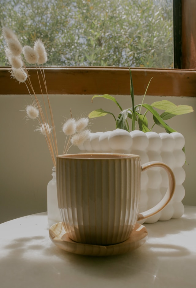 Cup of coffee by window