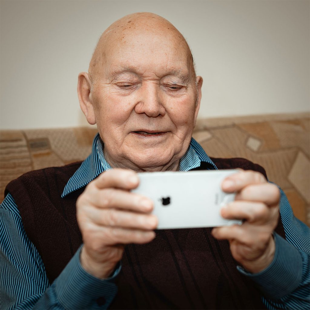 Aspen Court resident using phone