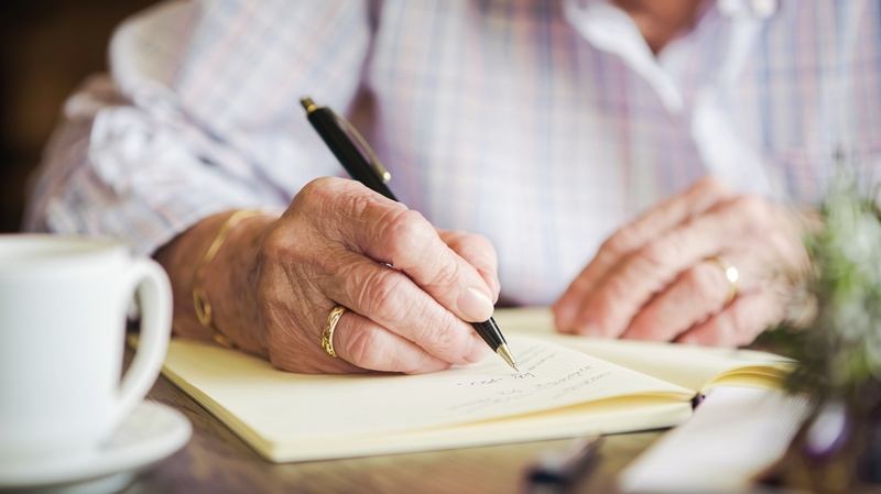 writing in notebook